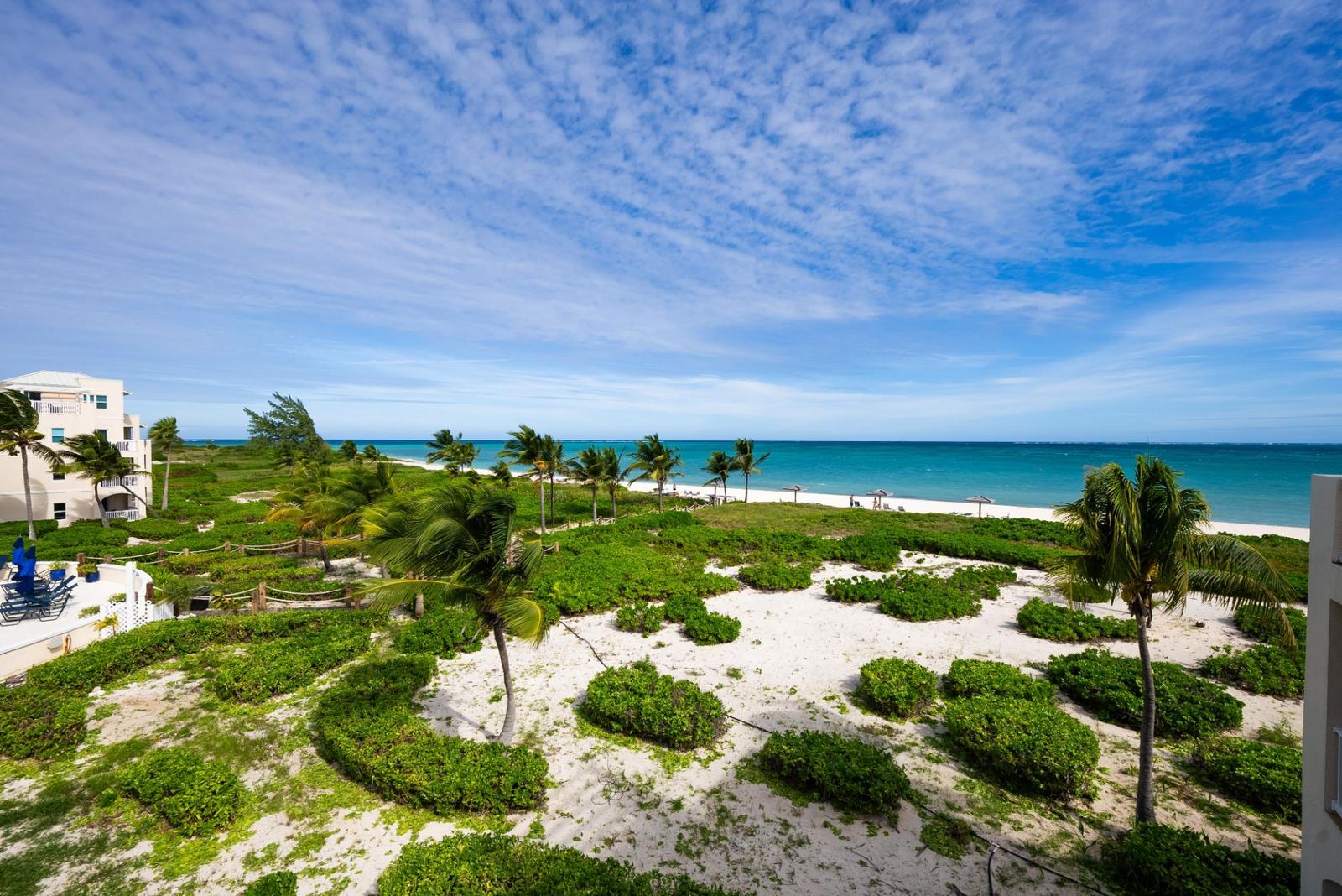 The beach at Northwest Point from the air, with open turquoise water
